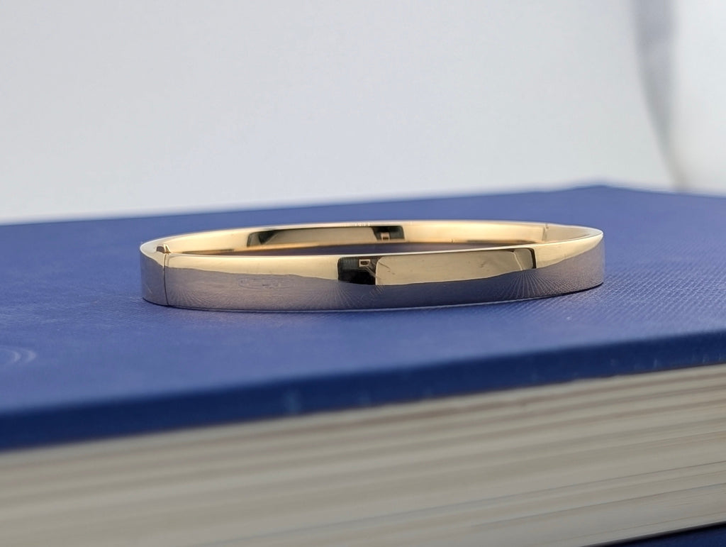 14 karat 6.5mm Flat Bangle - 8.3g