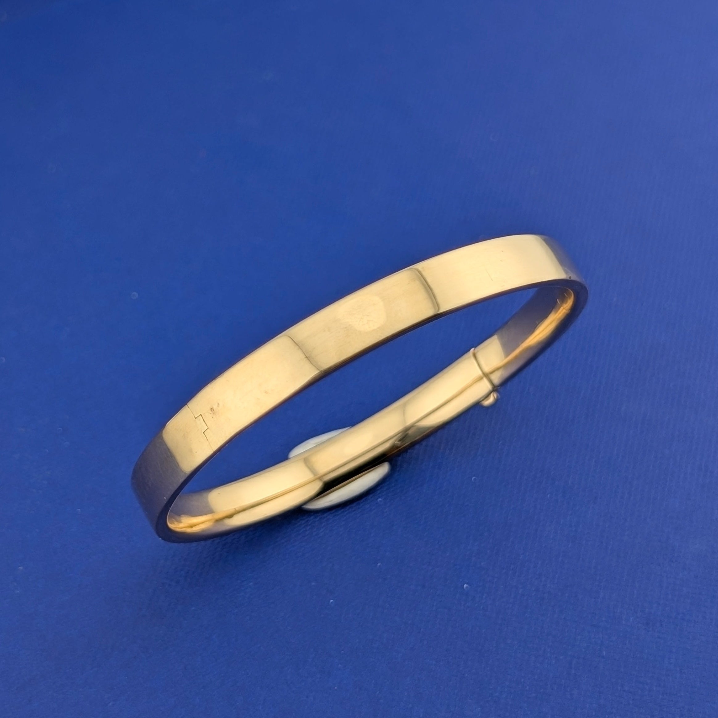 14 karat 6.5mm Flat Bangle - 8.3g