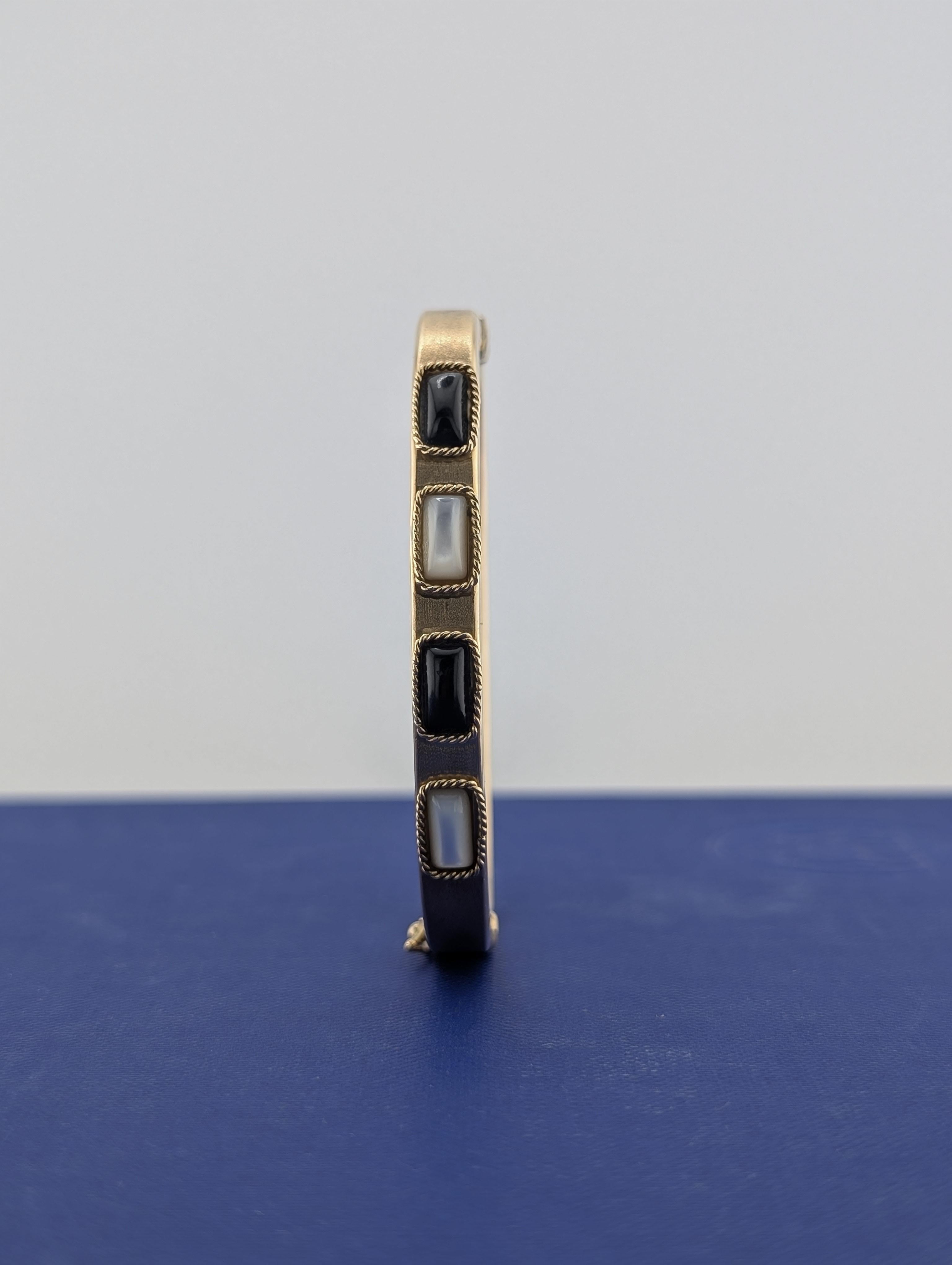14ky Yellow Gold Black Onyx and Mother of Pearl Hinged Bangle - 11.6g