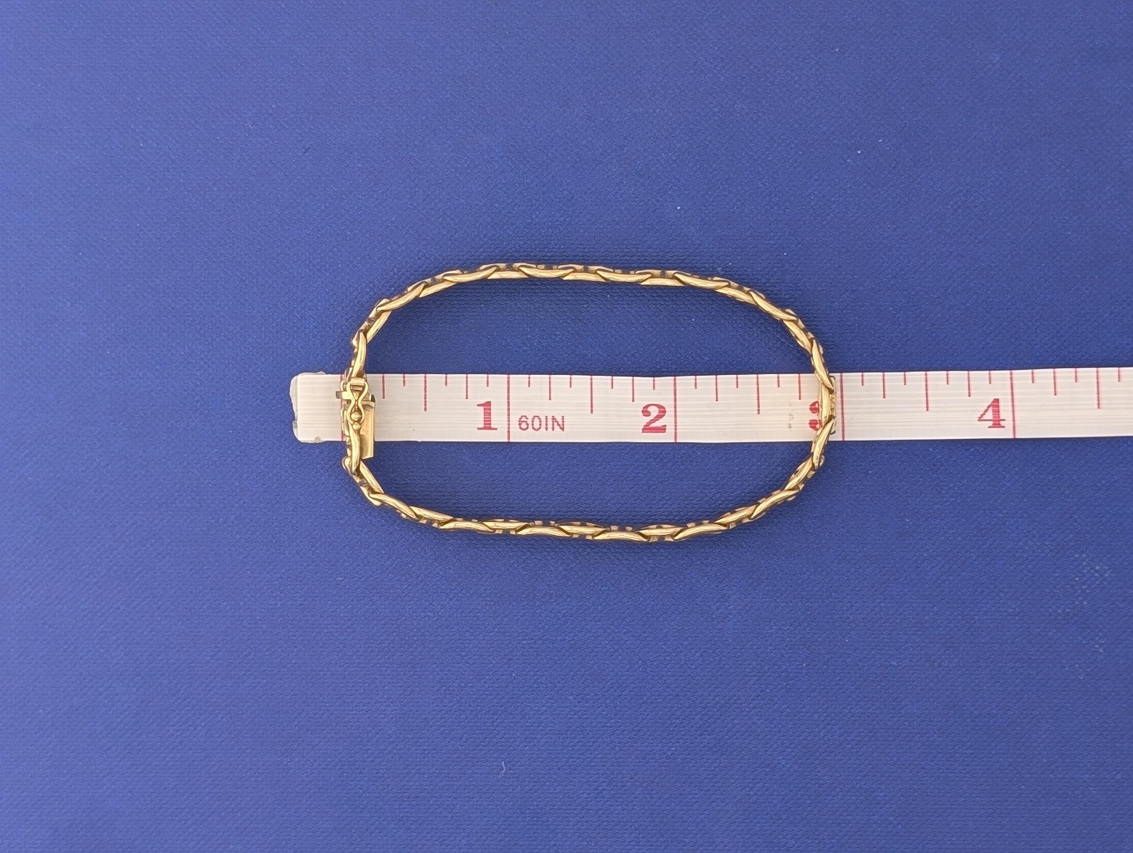 14kt Yellow Gold dosed x-link Bracelet - 26.1g
