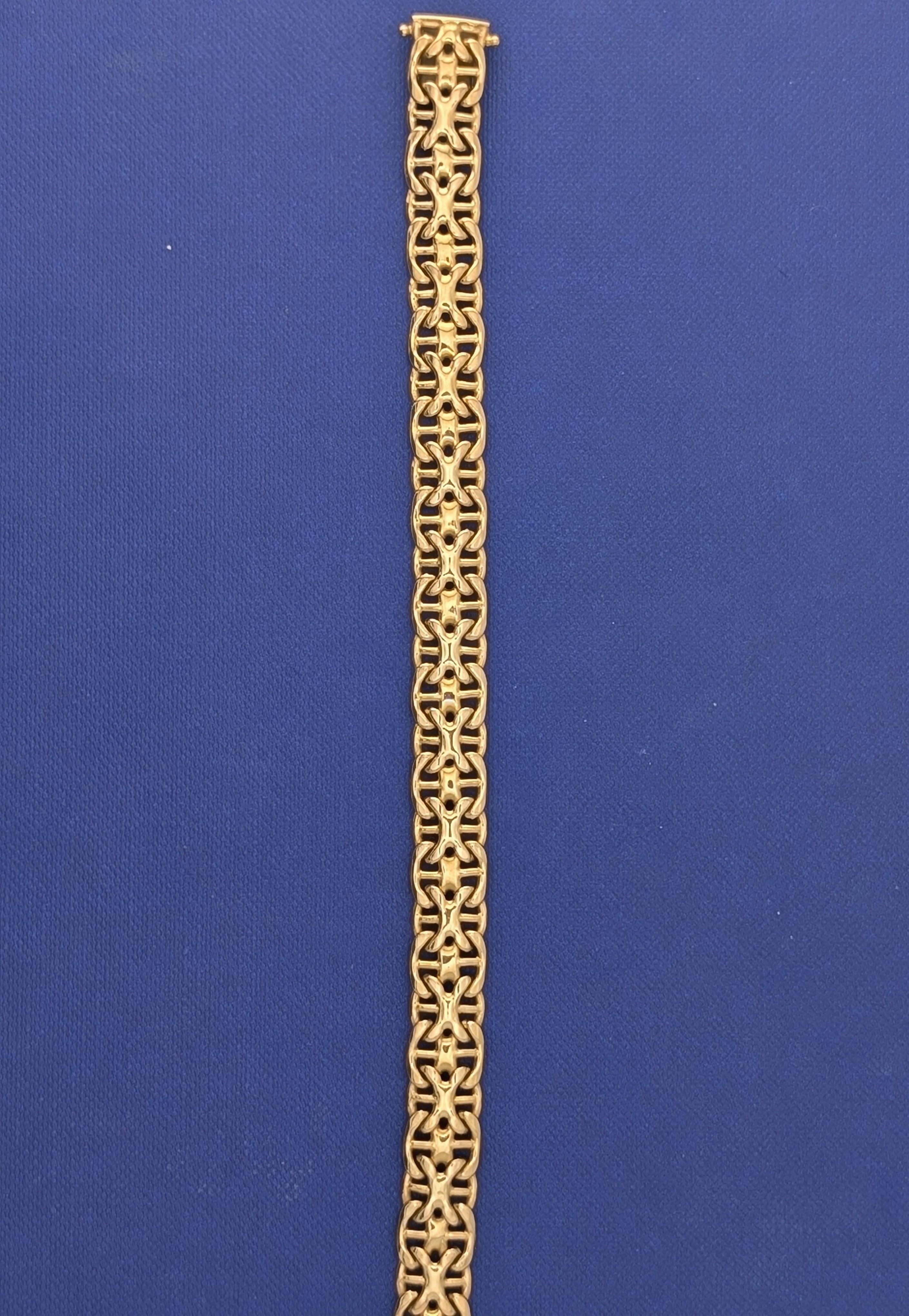 14kt Yellow Gold dosed x-link Bracelet - 26.1g