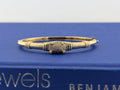 14 kt yellow gold ribbed and pave top bangle
